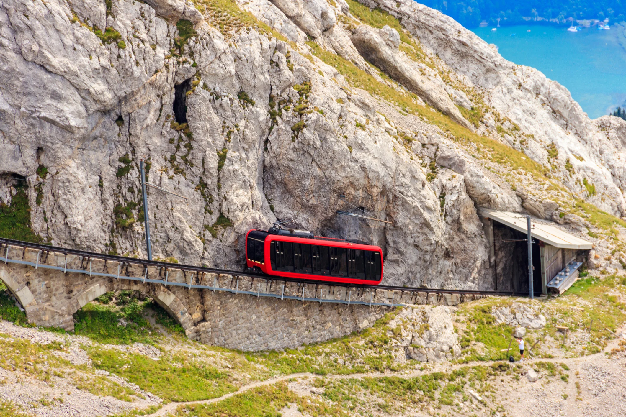 Cogwheel train climbing to the top of Mount Pilatus in Canton Lucerne, Switzerland. World's steepest cogwheel railway